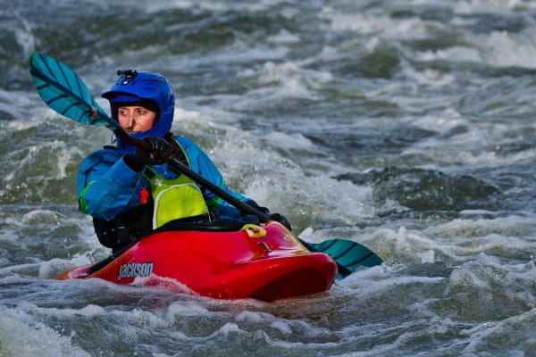 kayaker in a dry suit