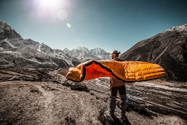 man with sleeping bag