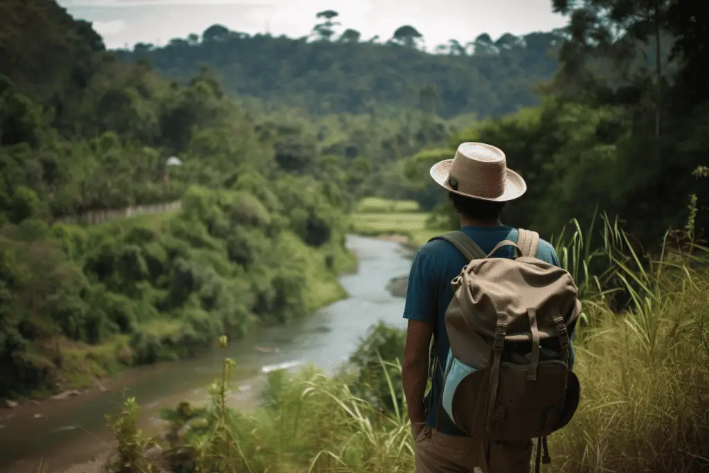 young section hiker looking at a river crossing